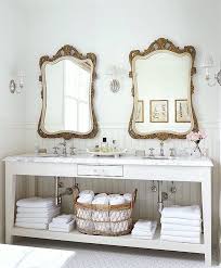 antique mirrors in a bathroom adding