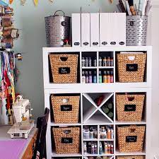 Peg board walls give this room plenty of room for storing and organizing craft supplies! 15 Creative Craft Room Organization Ideas