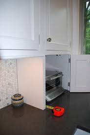 toaster oven in cabinet