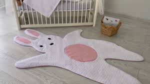 cute rabbit carpet making baby and