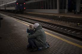 tearful goodbyes at kyiv train station