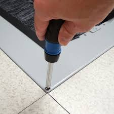 raised floor tile with brush strip