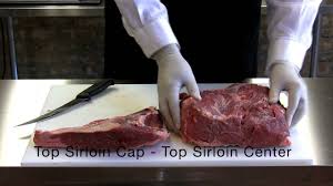 cutting the top sirloin cap beef