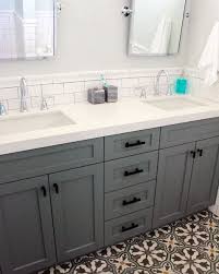 A backsplash can serve as a focal point for the room while it protects the wall above the sink from water damage. Smart Idea Bathroom Sink Tile Backsplash Ideas