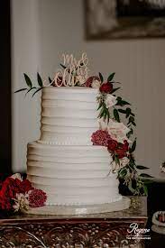 Maybe you would like to learn more about one of these? White Textured 2 Tier Wedding Cake Cascading With Burgundy And Blush Flowers And Greenery Winter Wedding Cake Wedding Cakes With Flowers Burgundy Wedding Cake