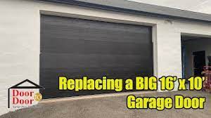 installing a big 16x10 garage door in