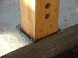 wood post to concrete connections