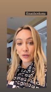 hilary duff hides stomach in baggy