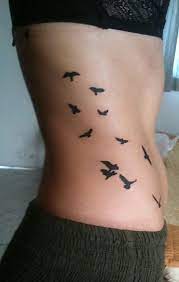 Although big bird tattoos look more intricate, especially if you have chosen a bird breed with lots of feathers, a lot of people prefer small bird tattoos because they think these look nicer on the skin. 25 Unique Bird Flocks Tattoos To Try This Year Bird Tattoos For Women Bird Tattoo Ribs Rib Tattoo