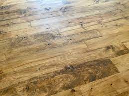 staining our floors with dark tung oil