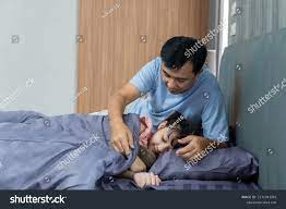 2,545 Asian Dad Kids Bed Images, Stock Photos, 3D objects, & Vectors |  Shutterstock