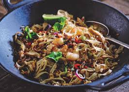 Then cook the chicken, whisk together the sauce, cook the vegetables, mix in the eggs, and toss together with the noodles and sauce. Chicken And Prawn Pad Thai Recipe