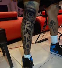 Select from 383 premium chris brown tattoo of the highest browse 383 chris brown tattoo stock photos and images available, or start a new search to explore more stock photos and images. Aeko Lettering Tattoo On Chris Brown S Shin For His
