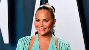The internet's coolest mom, chrissy teigen, got some new ink a while back and debuted the design on instagram. Chrissy Teigen Shows Off New Tattoo Inspired By John Legend Song