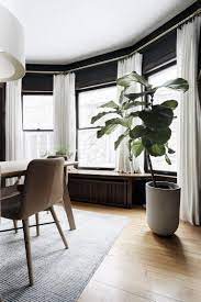 hanging curtains in a bay window
