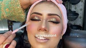 makeup with peach and gold dress you