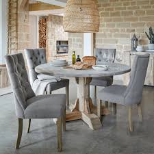 Crafted from reclaimed wood, this table from our bartol collection has angled legs, a stretcher bar and a rustic finish with a. Sienna 140cm Round Reclaimed Wood Dining Table 4 Grenada Chairs