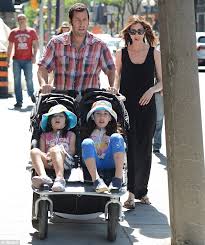 Adam sandler has a very unique parenting style. Adam Sandler And Wife Jackie Take Their Daughters Age Eight And Five Out In A Stroller Daily Mail Online