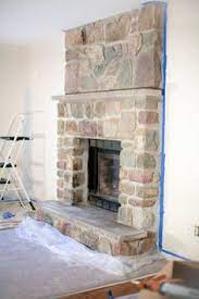 No more 70's stone fireplace! 45 Painted Stone Fireplace Ideas Painted Stone Fireplace Stone Fireplace Fireplace
