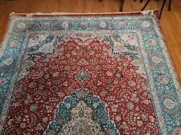 notch persian qum silk medallion carpet