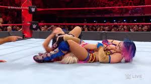 Alexa bliss looks to continue building a case for a women's tag team championship opportunity, as she battles asuka. Asuka Vs Alexa Bliss Raw Jan 1 2018 On Make A Gif