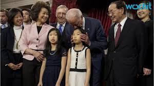 Biden branded 'creepy' over hands-on ceremony