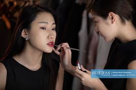 chinese makeup artist applying makeup