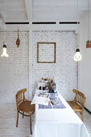 Love the texture brick gives to your walls but not a fan of the color? Painting Brick Walls White An Increasingly Popular Trend