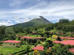 Watching the spectacular view of the arenal. Hotel Arenal Volcano Inn Community Facebook