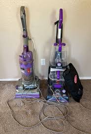 a dyson vacuum and hoover carpet cleaner