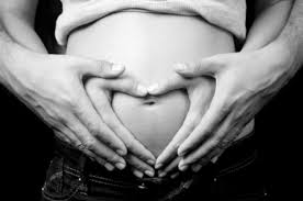 Image result for a pregnant woman and her husband
