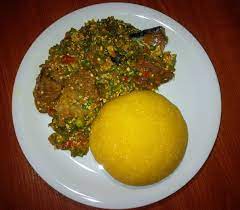 Sprinkle the garri into the boiled water. What Is Eba How To Prepare Garri