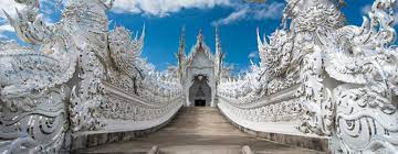 The architecture and designs on the walls of the temple are all well done. Wat Rong Khun The White Temple Of Chiang Rai On The Go Tours Blog