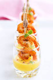 Going to a big gathering soon? Succulent Shrimp Shooters With Mango Sauce Tapas Recipes Elegant Appetizers Appetizer Recipes