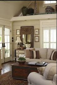 To make the ceilings look even taller and bring more light into the room, paint the wall white. Just Like It Farm House Living Room Country Living Room Design French Country Living Room
