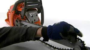 How to Fit the Bar and Chain on a Husqvarna Chainsaw - YouTube