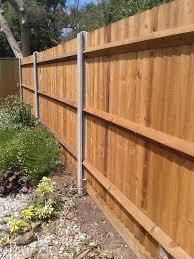 Close Boarded Fence With Concrete Posts