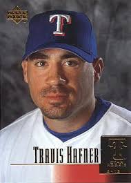 This is an official Travis Hafner Rookie Card, produced by Upper Deck Baseball in 2001. - hafner-ud