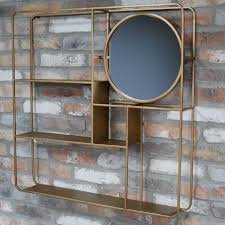 Gold Wall Unit With Shelves And Mirror