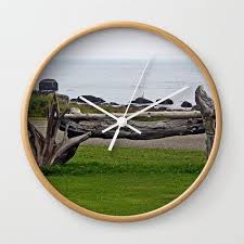 Driftwood Fence And The Sea Wall Clock