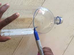 a magnifying gl with a plastic bottle