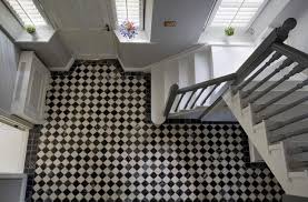 black white tiled hallway