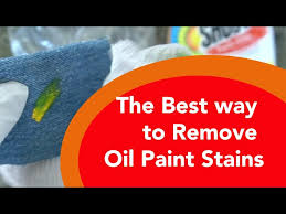 remove oil paint from clothing