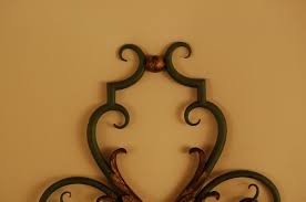 Patinated Wrought Iron Wall Sconces