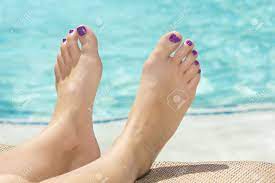 Beautiful Sexy Feet And Toes By The Swimming Pool Stock Photo, Picture and  Royalty Free Image. Image 19432554.