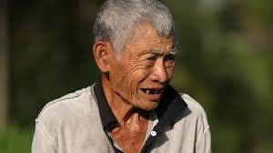 portrait of older asian man with