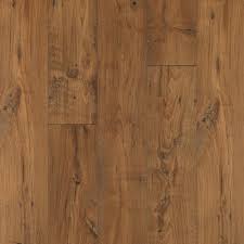 Even the lowest quality luxury vinyl plank floor can put on a good show when you don't examine it too carefully. Interlocking Waterproof Laminate Flooring At Lowes Com