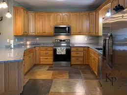 Take time to learn about different cabinet styles and materials before making your final selections. Benjamin Moore Soft Chamois Bye Bye Honey Oak Honey Oak Kitchen Cabinets Oak Kitchen Cabinets How To Paint Oak Painting Kitchen Cabinets Can You Paint Oak Cabinets Can You Paint Wood Cabinets