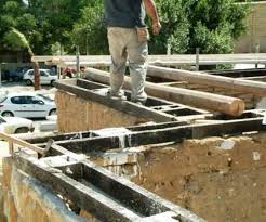 installation of a wooden ring beam on