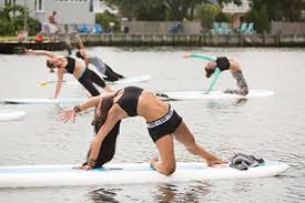 why we love paddle board yoga and you